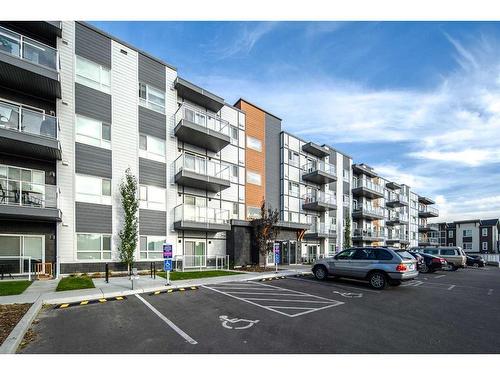 222-360 Harvest Hills Way Ne, Calgary, AB - Outdoor With Balcony With Facade