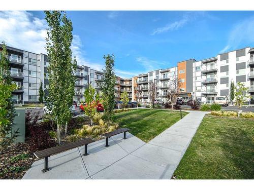 222-360 Harvest Hills Way Ne, Calgary, AB - Outdoor With Balcony With Facade