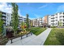 222-360 Harvest Hills Way Ne, Calgary, AB  - Outdoor With Balcony With Facade 