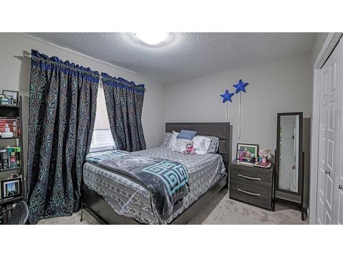 115 Saddlelake Way Ne, Calgary, AB - Indoor Photo Showing Bedroom