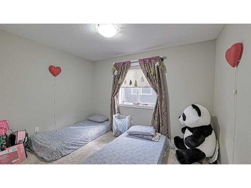 115 Saddlelake Way Ne, Calgary, AB - Indoor Photo Showing Bedroom