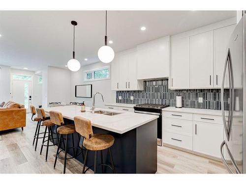 #1-632 56 Ave Sw, Calgary, AB - Indoor Photo Showing Kitchen With Double Sink With Upgraded Kitchen