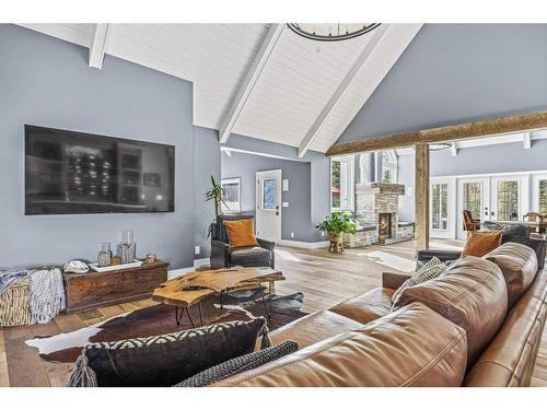 330008 Highway 22 West Highway, Rural Foothills County, AB - Indoor Photo Showing Living Room With Fireplace