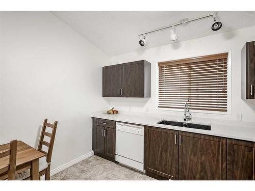 30 Martinwood Road Ne, Calgary, AB - Indoor Photo Showing Kitchen With Double Sink