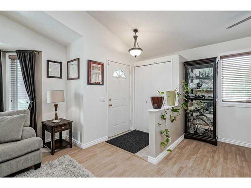 30 Martinwood Road Ne, Calgary, AB - Indoor Photo Showing Living Room With Fireplace