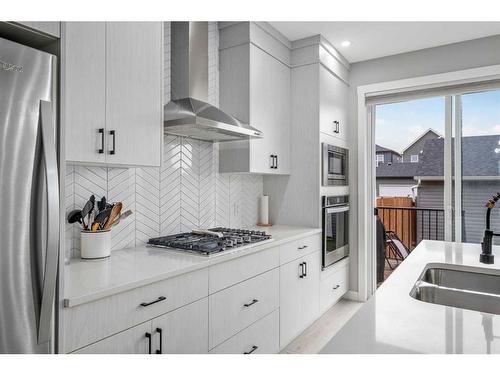 20624 Main Street Se, Calgary, AB - Indoor Photo Showing Kitchen With Double Sink With Upgraded Kitchen