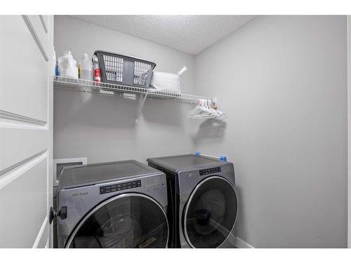 20624 Main Street Se, Calgary, AB - Indoor Photo Showing Laundry Room