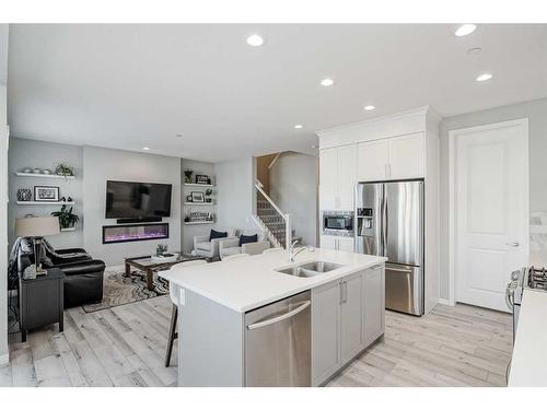 64 Howse Hill Ne, Calgary, AB - Indoor Photo Showing Kitchen With Double Sink