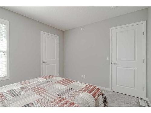 64 Howse Hill Ne, Calgary, AB - Indoor Photo Showing Bedroom