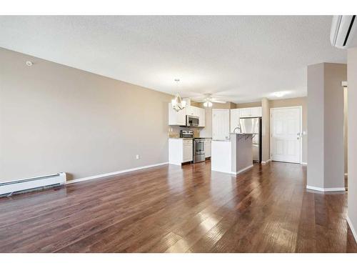 404-260 Shawville Way Se, Calgary, AB - Indoor Photo Showing Living Room