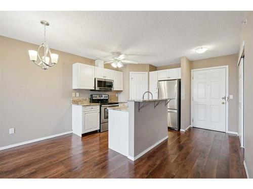 404-260 Shawville Way Se, Calgary, AB - Indoor Photo Showing Kitchen With Stainless Steel Kitchen