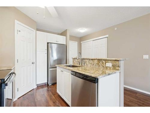 404-260 Shawville Way Se, Calgary, AB - Indoor Photo Showing Kitchen With Stainless Steel Kitchen