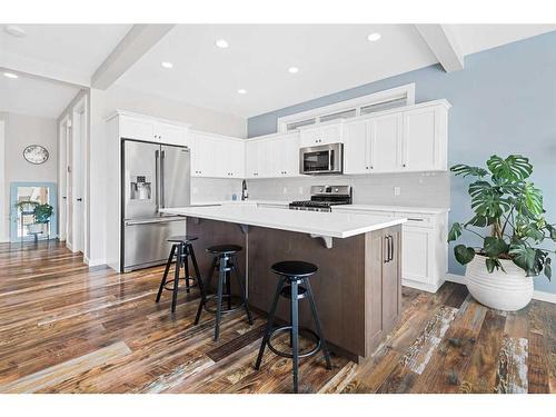 227 Reunion Green Nw, Airdrie, AB - Indoor Photo Showing Kitchen With Upgraded Kitchen