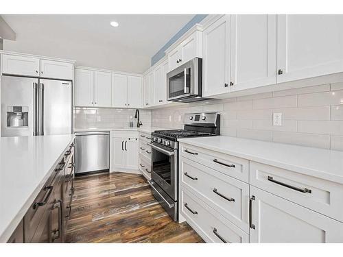 227 Reunion Green Nw, Airdrie, AB - Indoor Photo Showing Kitchen With Upgraded Kitchen