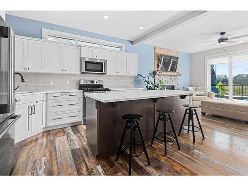 227 Reunion Green Nw, Airdrie, AB - Indoor Photo Showing Kitchen With Upgraded Kitchen