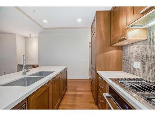 712-222 Riverfront Avenue Sw, Calgary, AB - Indoor Photo Showing Kitchen With Double Sink