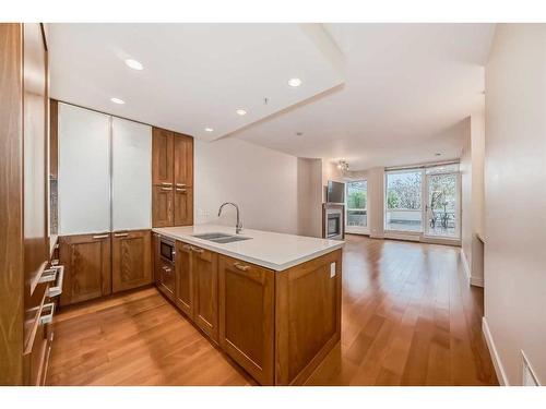 712-222 Riverfront Avenue Sw, Calgary, AB - Indoor Photo Showing Kitchen With Double Sink