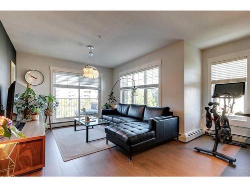 2302-11 Mahogany Row Se, Calgary, AB - Indoor Photo Showing Living Room