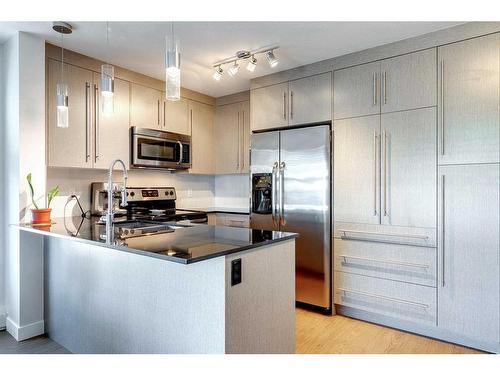 2302-11 Mahogany Row Se, Calgary, AB - Indoor Photo Showing Kitchen With Stainless Steel Kitchen