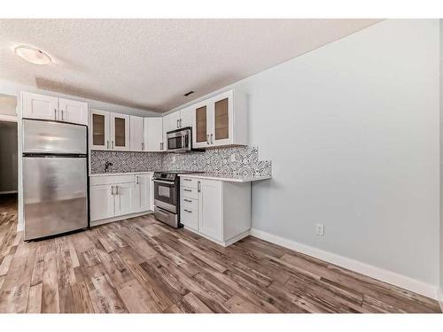 33 Auburn Crest Green Se, Calgary, AB - Indoor Photo Showing Kitchen With Stainless Steel Kitchen