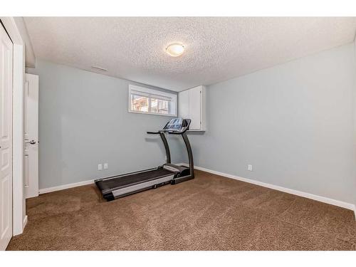 33 Auburn Crest Green Se, Calgary, AB - Indoor Photo Showing Gym Room