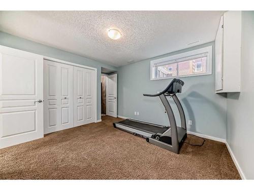 33 Auburn Crest Green Se, Calgary, AB - Indoor Photo Showing Gym Room