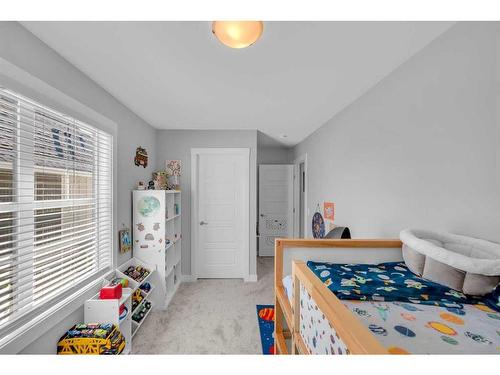 859 Cranston Avenue Se, Calgary, AB - Indoor Photo Showing Bedroom