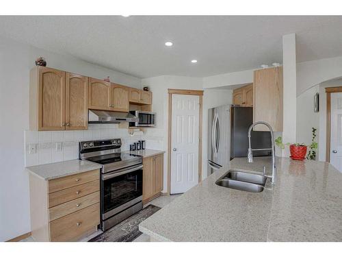 28 Tarawood Grove Ne, Calgary, AB - Indoor Photo Showing Kitchen With Double Sink