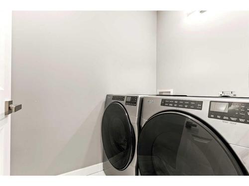 519 Sierra Morena Court Sw, Calgary, AB - Indoor Photo Showing Laundry Room