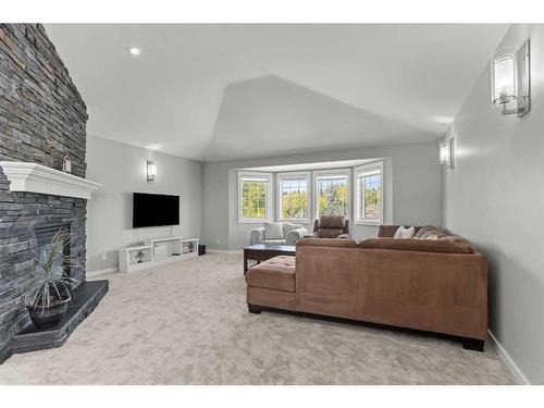 519 Sierra Morena Court Sw, Calgary, AB - Indoor Photo Showing Living Room With Fireplace