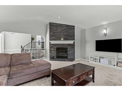 519 Sierra Morena Court Sw, Calgary, AB - Indoor Photo Showing Living Room With Fireplace