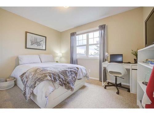 121 Bridlerange Circle Sw, Calgary, AB - Indoor Photo Showing Bedroom