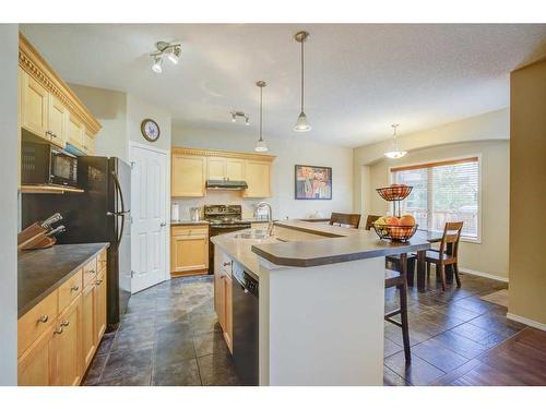 121 Bridlerange Circle Sw, Calgary, AB - Indoor Photo Showing Kitchen