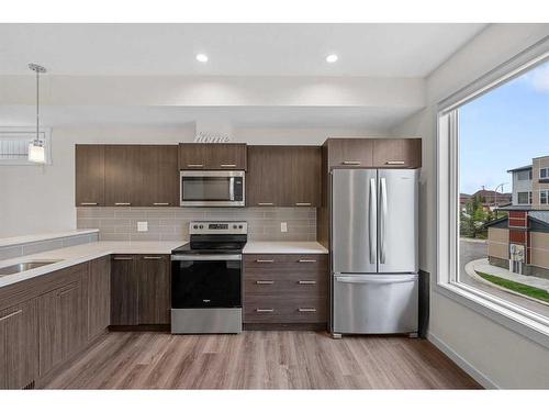 506-70 Saddlestone Drive Ne, Calgary, AB - Indoor Photo Showing Kitchen With Upgraded Kitchen