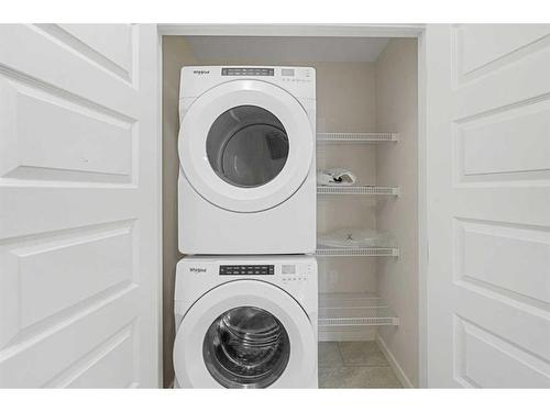 506-70 Saddlestone Drive Ne, Calgary, AB - Indoor Photo Showing Laundry Room