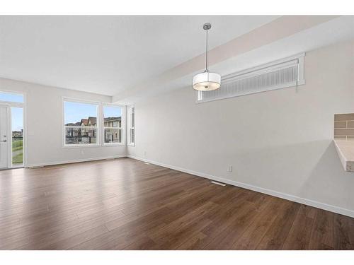 506-70 Saddlestone Drive Ne, Calgary, AB - Indoor Photo Showing Living Room