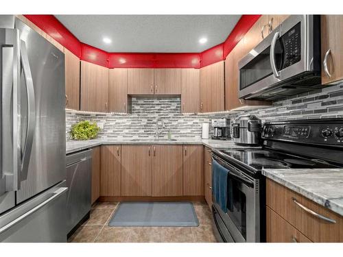 131 Falworth Way Ne, Calgary, AB - Indoor Photo Showing Kitchen With Stainless Steel Kitchen With Upgraded Kitchen