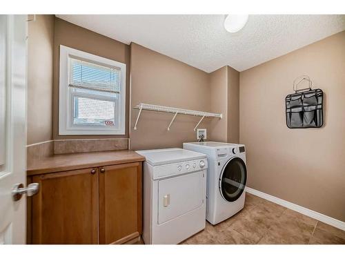 96 Weston Manor Sw, Calgary, AB - Indoor Photo Showing Laundry Room