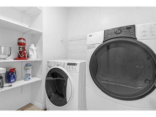 9416 Hidden Valley Drive Nw, Calgary, AB - Indoor Photo Showing Laundry Room