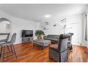 9416 Hidden Valley Drive Nw, Calgary, AB  - Indoor Photo Showing Living Room 