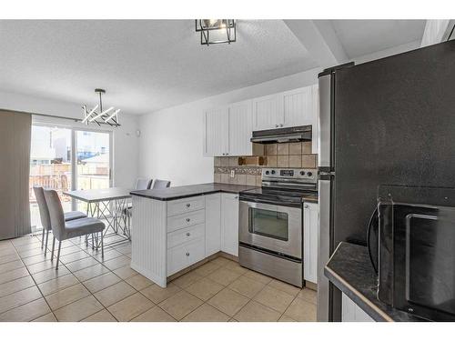 9416 Hidden Valley Drive Nw, Calgary, AB - Indoor Photo Showing Kitchen