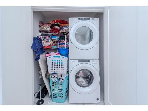 730 Savanna Landing Ne, Calgary, AB - Indoor Photo Showing Laundry Room