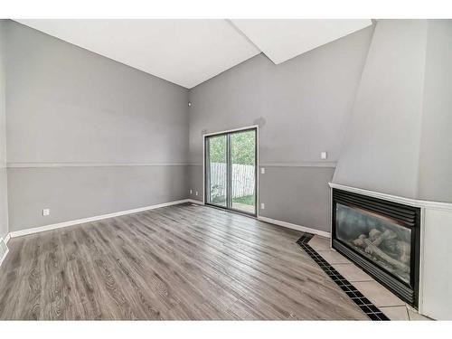 502-919 38 Street Ne, Calgary, AB - Indoor With Fireplace