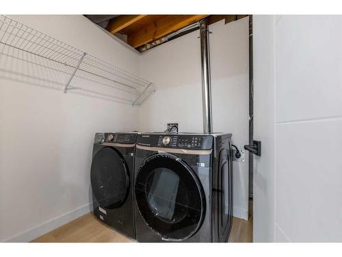 47 Kingsland Villas Sw, Calgary, AB - Indoor Photo Showing Laundry Room