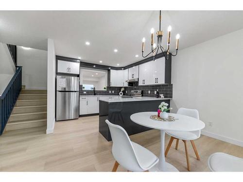 47 Kingsland Villas Sw, Calgary, AB - Indoor Photo Showing Dining Room