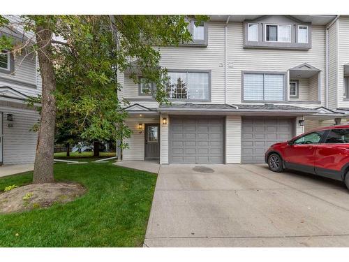 47 Kingsland Villas Sw, Calgary, AB - Outdoor With Facade