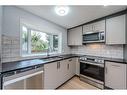 5655 Dalhousie Drive Nw, Calgary, AB  - Indoor Photo Showing Kitchen With Double Sink 