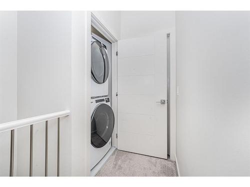 75 Saddlestone Drive Ne, Calgary, AB - Indoor Photo Showing Laundry Room