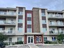 206-300 Harvest Hills Place Ne, Calgary, AB  - Outdoor With Balcony With Facade 