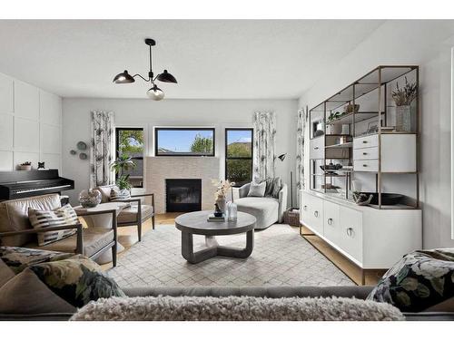 4628 Quentin Street Sw, Calgary, AB - Indoor Photo Showing Living Room With Fireplace